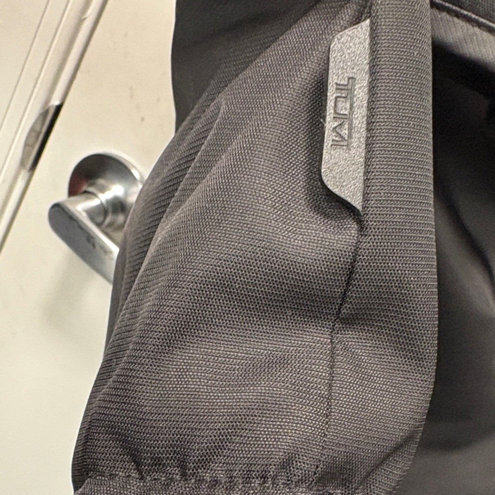 TUMI BLACK PUFFER COAT WITH TAN FUR TRIM. - Picture 7 of 16